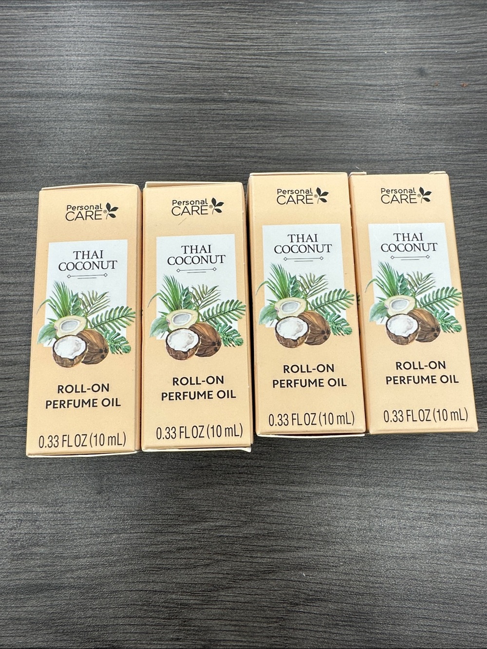 Personal Care Thai Coconut Roll-On Perfume Oil - Peach Packaging 4PK New
